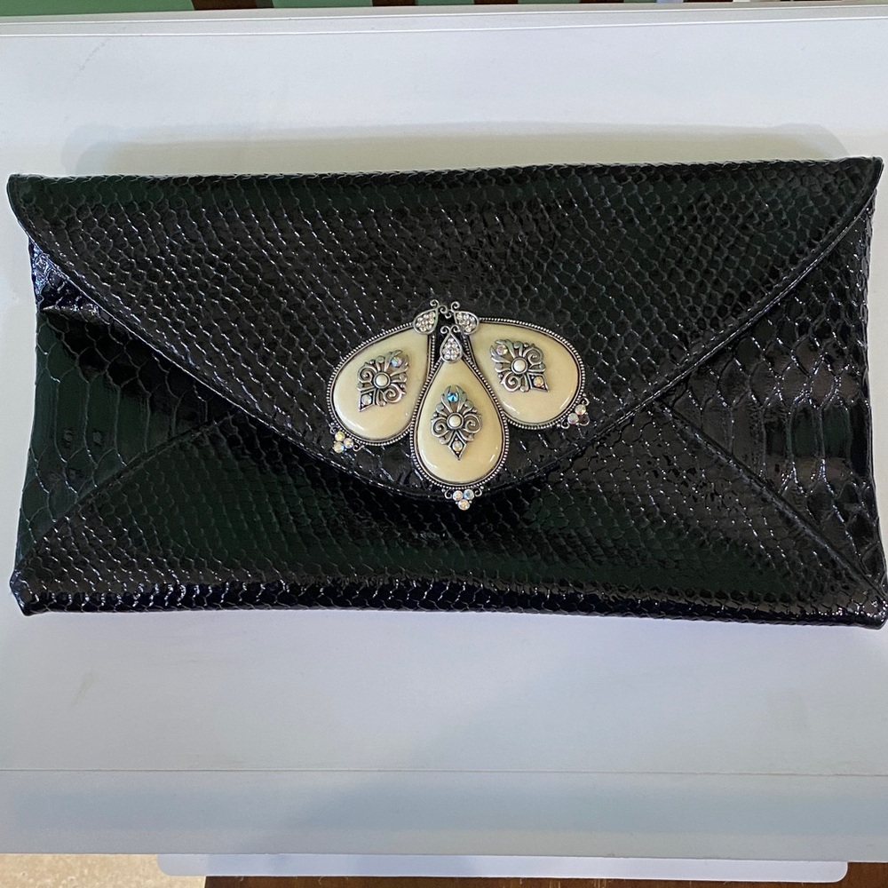 Iris Lane Elegant Black ivory stone Clutch one stone missing on right side